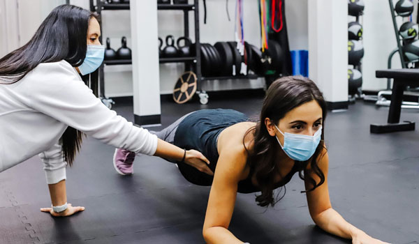 Female Personal Trainer with Client